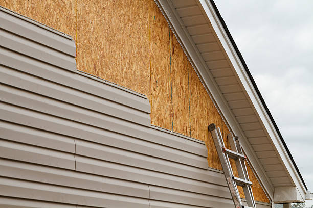 Professional Siding Contractor technician working in Centerville, IN